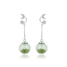 E-709 boucles d&#39;oreilles pendantes en zircon en forme de lune avec un style particulier